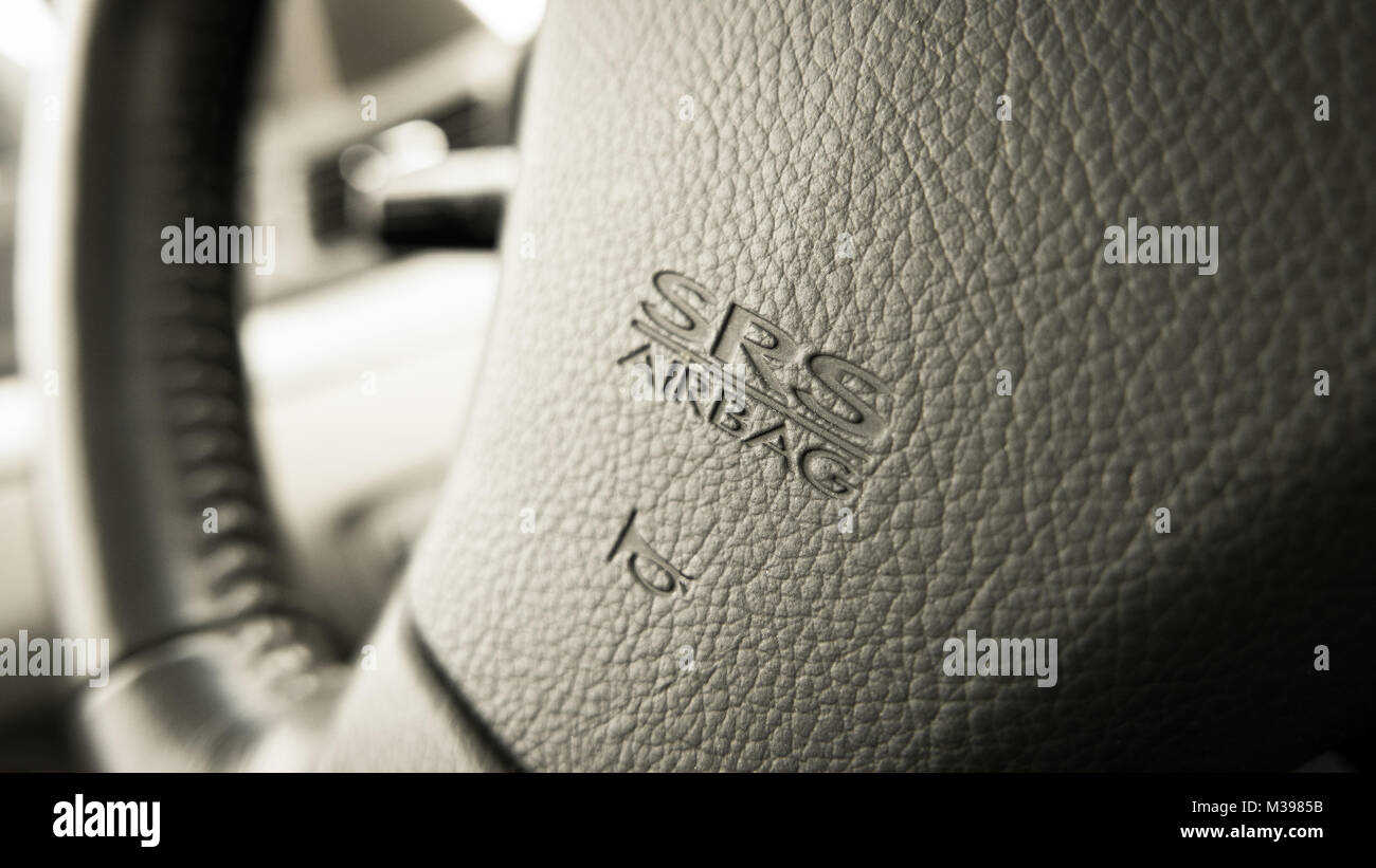 close up of Subaru SRS Airbag logo on Subaru steering wheel Stock Photo
