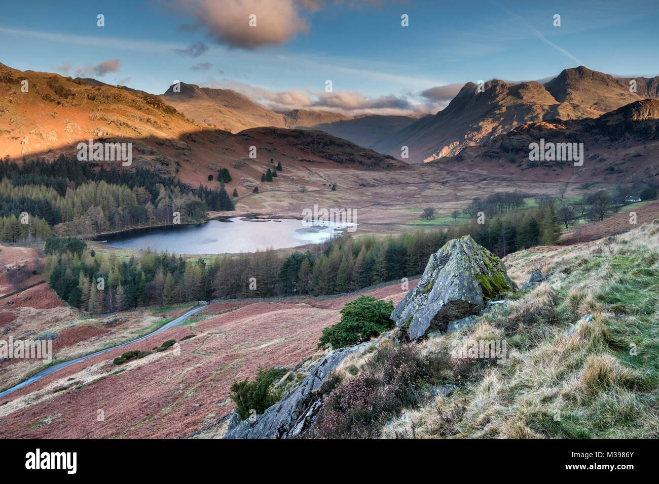 Blea Tarn and the Langdale Pikes at sunrise, Little Langdale, Lake District National Park, Cumbria, England, UK Stock Photo