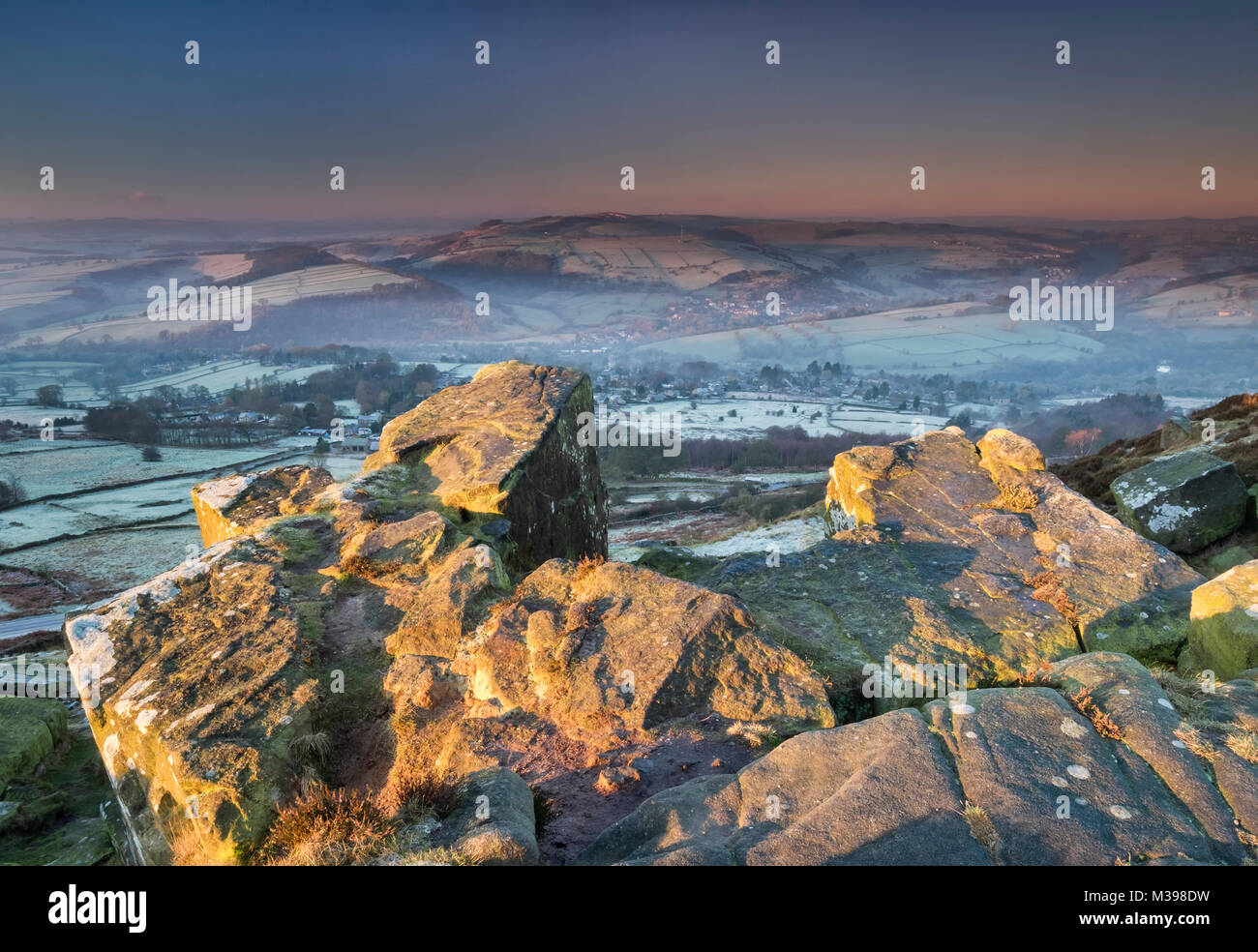 Winters dawn from Curbar Edge, Peak District National Park, Derbyshire, England, UK Stock Photo