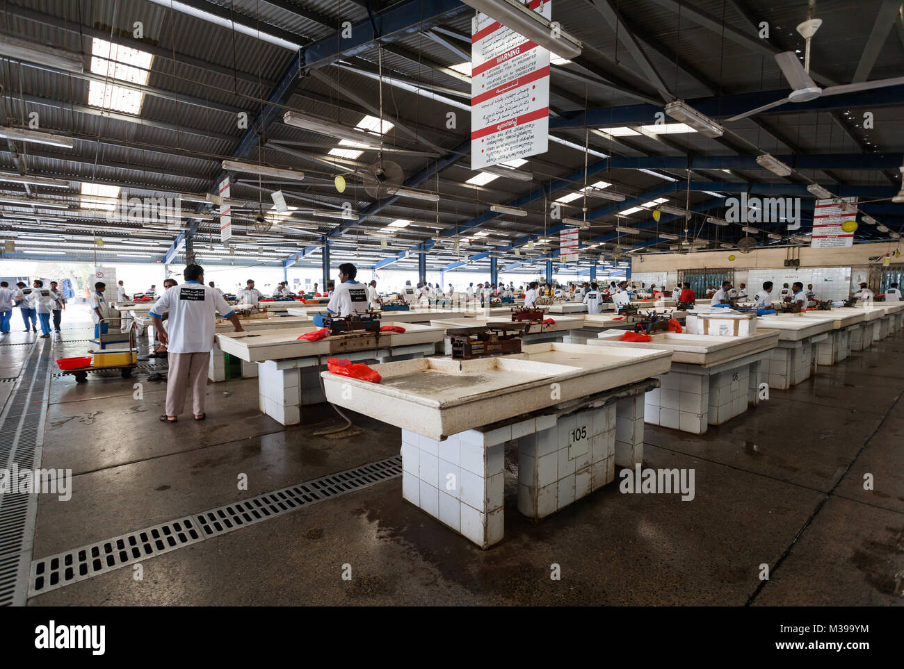 Deira,Dubai, UAE May 17,2014 Fishermen sell fresh fish at the daily fishmarket.Dubai fish