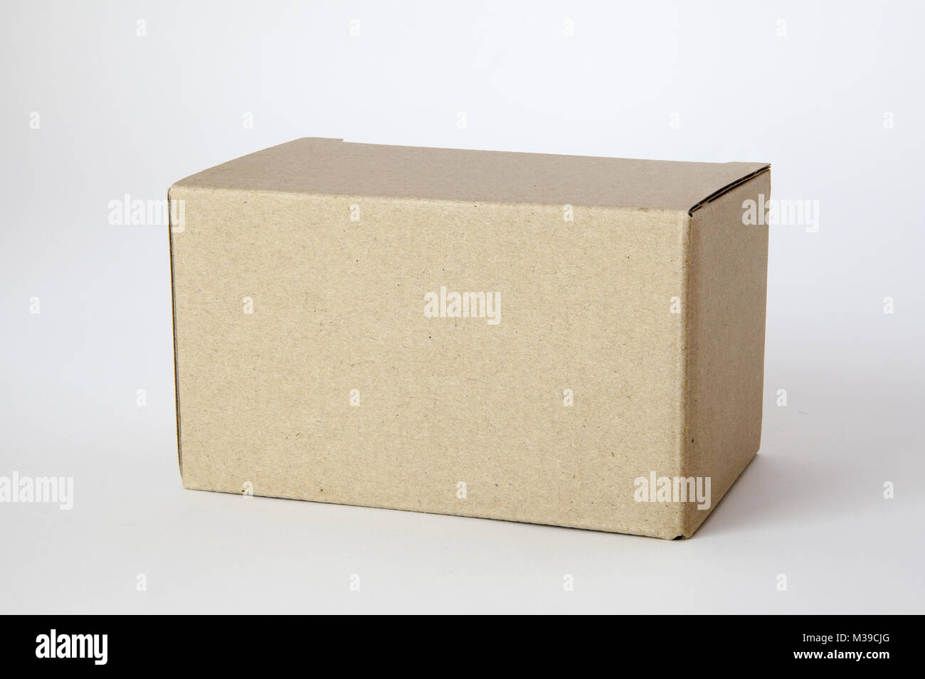 Luggage in the box of cardboard boxes Stock Photo Alamy