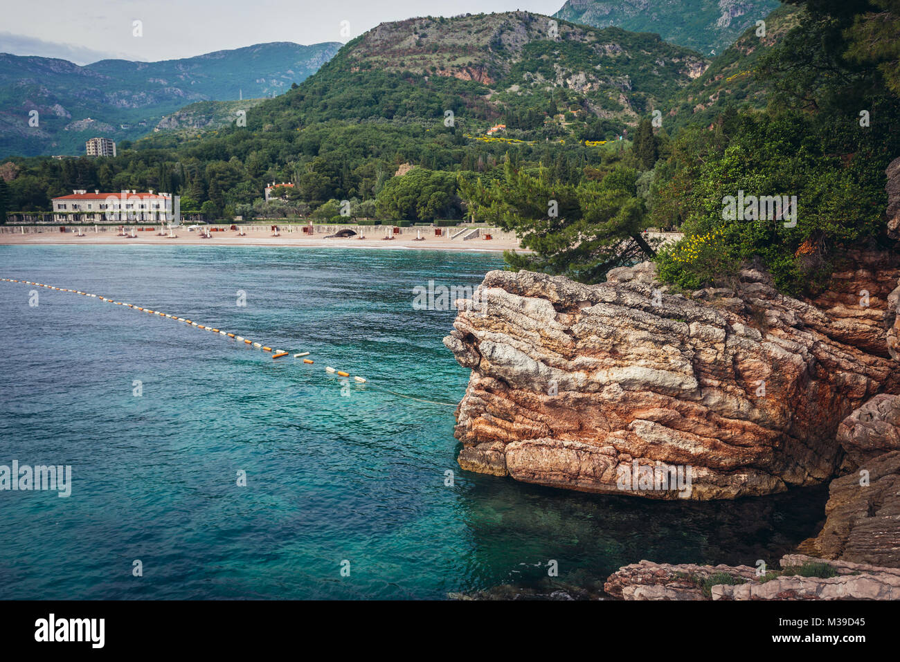 Queen’s Beach in front of Villa Milocer Aman Sveti Stefan luxury hotel in Przno, Montenegro Stock Photo