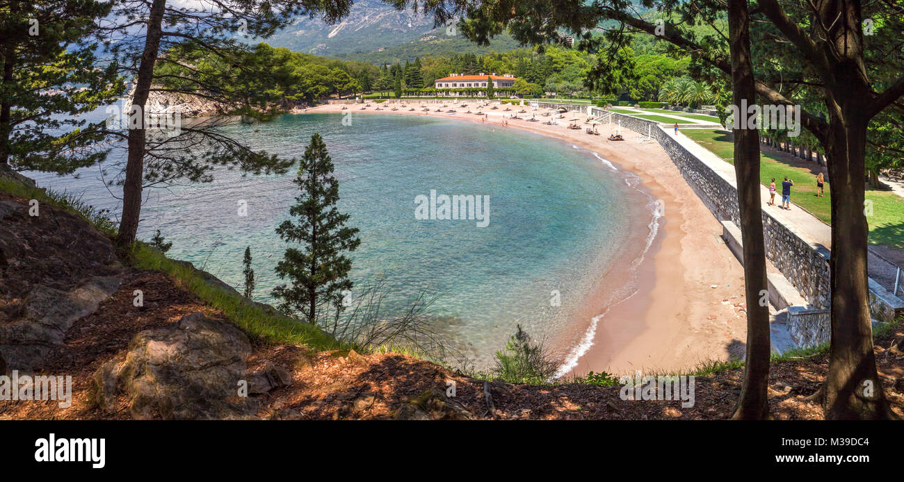 PRZNO, BUDVA RIVIERA AREA, MONTENEGRO, AUGUST 2, 2014: Panoramic view from forest of the elite beach in small lagoon near Przno Stock Photo