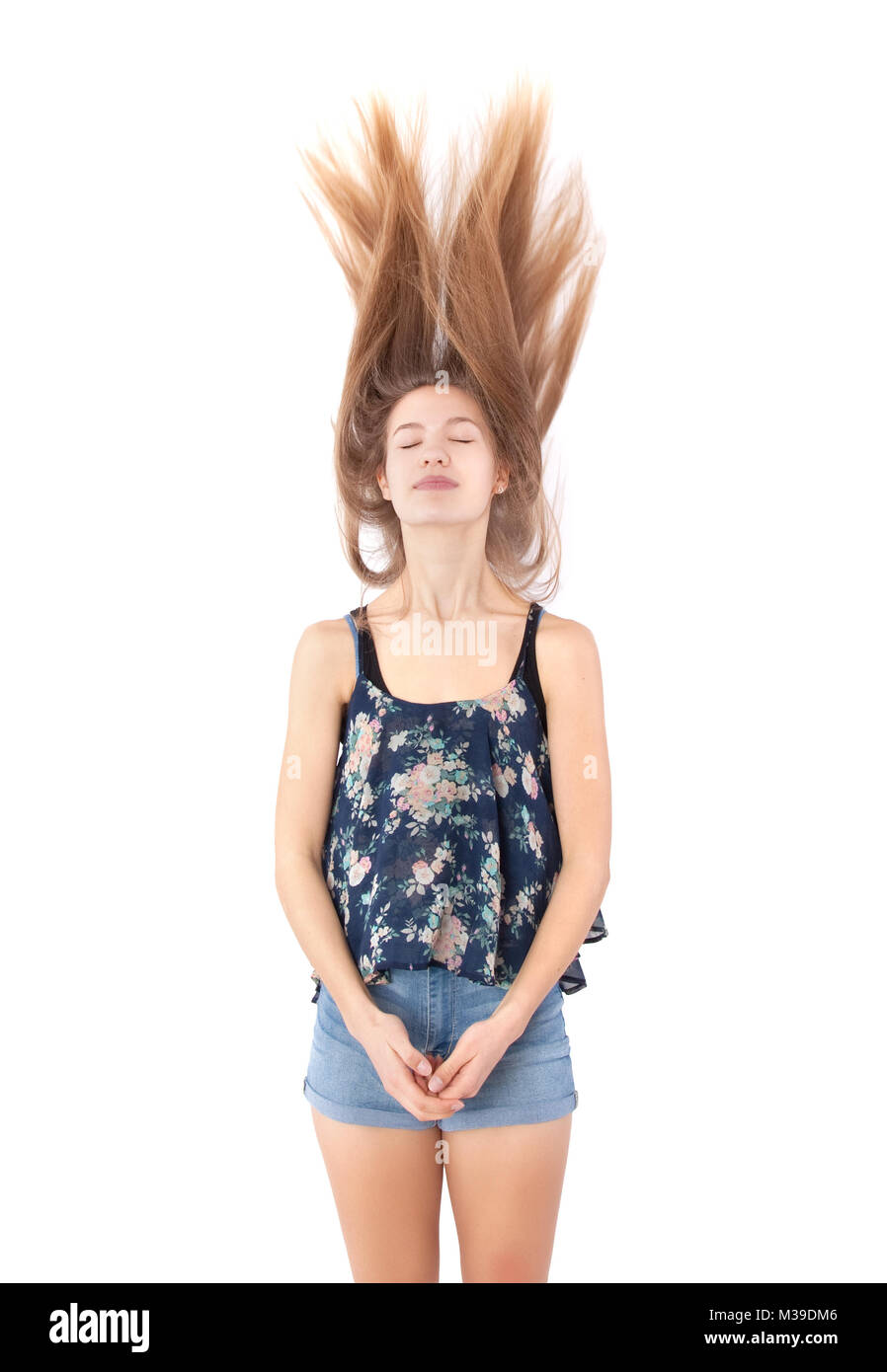 young girl with long blowing hair Stock Photo