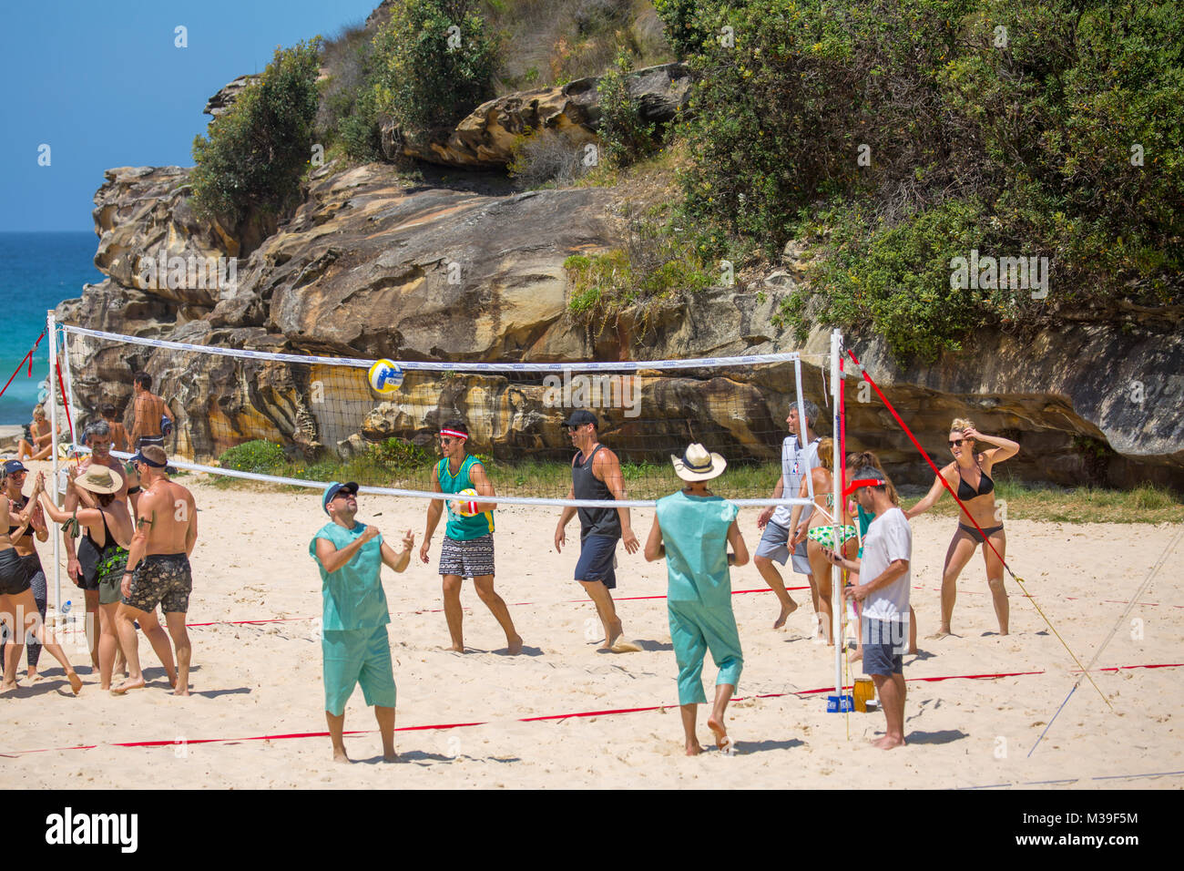 Game of beach volleyball on Tamarama beach in Sydney eastern suburbs