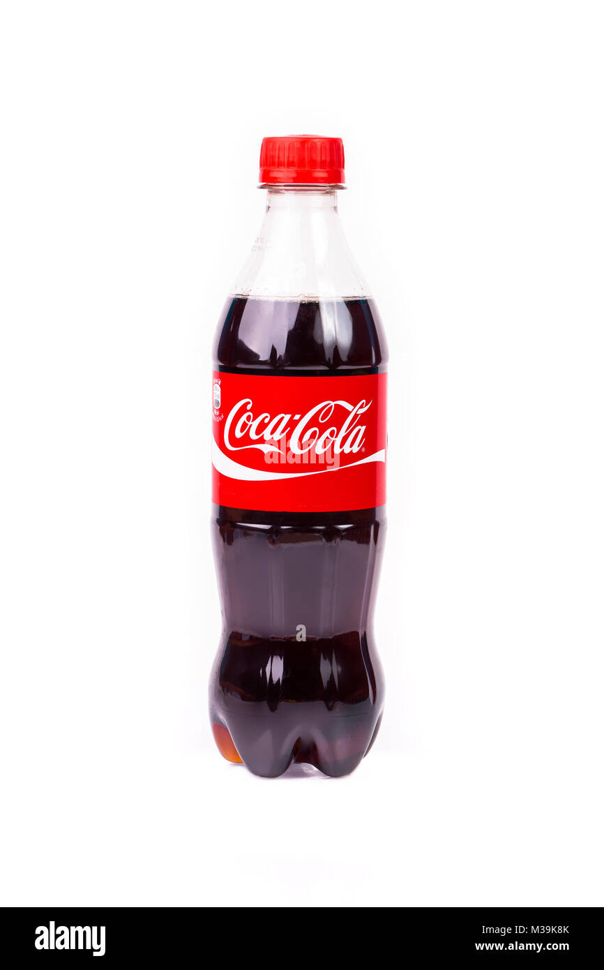 TRIESTE, ITALY - April 14, 2016, Plastic bottle of Coca-Cola . Isolated on white Background. Coca Cola, Coke is the most popular carbonated soft drink Stock Photo