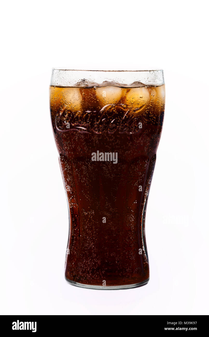 TRIESTE, ITALY - April 14, 2016, Glass of Coca-Cola. Isolated on white Background. Coca Cola, Coke is the most popular carbonated soft drink beverages Stock Photo