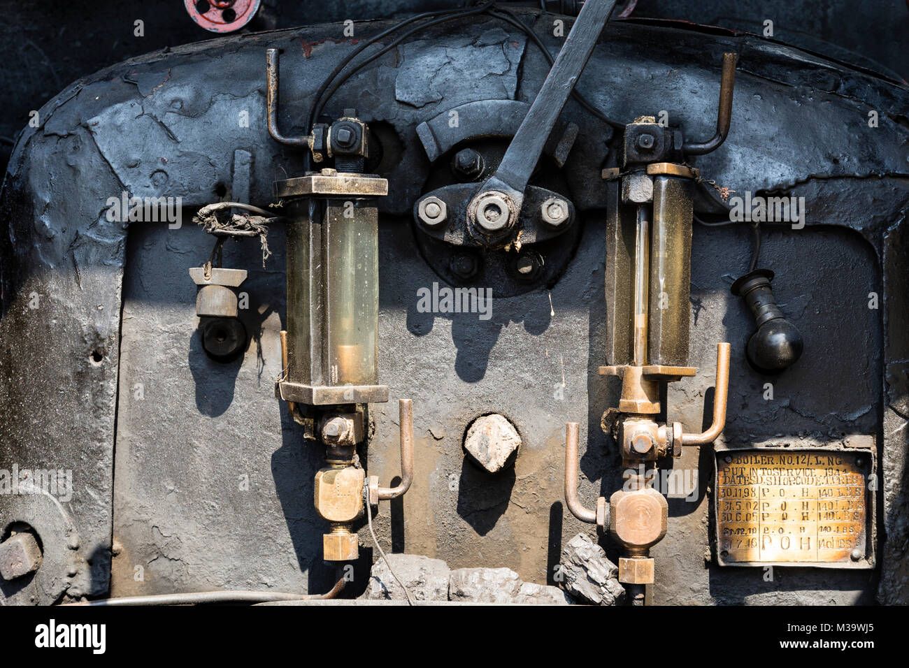 Darjeeling, India, March 3 2017: Closeup of the steam locomotive fire boiler of the famous toy train Stock Photo