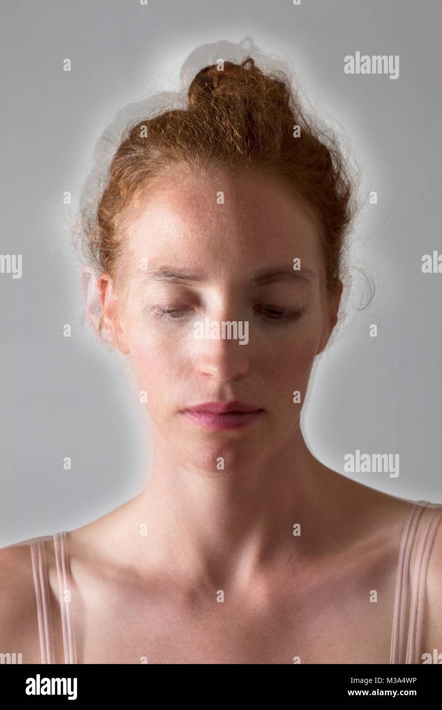 MODEL RELEASED. Composite image of depressed woman. Stock Photo