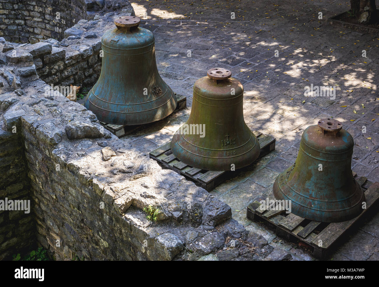 Old bells next to ruins of Roman baths Old Town of Budva city on the
