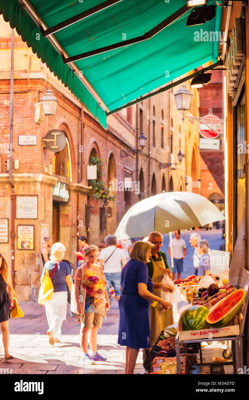 BOLOGNA, ITALY AUGUST 27, 2016 tourists and locals go shopping in