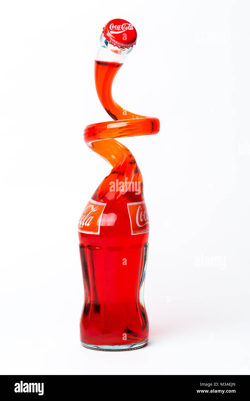 TRIESTE, ITALY - January 14, 2016, Coca-Cola Classic in a special edition glass bottle Isolated on white Background. Coca Cola, Coke is the most popul Stock Photo