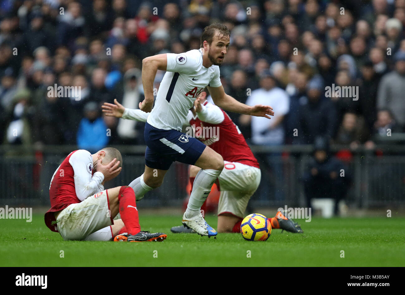 London, UK. 10th Feb, 2018. Jack Wilshere (A) Harry Kane (TH) Shkodran Mustafi (A) at the English Premier League football match between Tottenham Hotspur v Arsenal at Wembley Stadium, London, on February 10, 2018. **THIS PICTURE IS FOR EDITORIAL USE ONLY** Credit: Paul Marriott/Alamy Live News Stock Photo