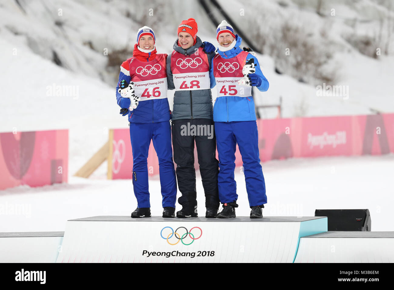 Pyeongchang, South Korea. 10th Feb, 2018. Champion Germany's Andreas Wellinger (C), second placed Norway's Johann Andre Forfang (L), and third placed Norway's Robert Johansson pose for photos during the venue ceremony of men's normal hill individual event of ski jumping at the 2018 PyeongChang Winter Olympic Games at Alpensia Ski Jumping Center, PyeongChang, South Korea, Feb. 10, 2018. Credit: Li Gang/Xinhua/Alamy Live News Stock Photo