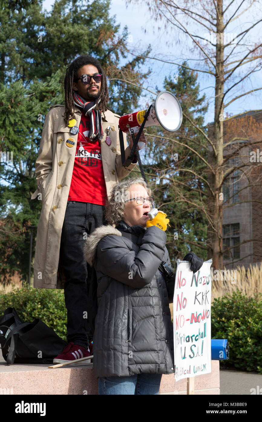 Seattle, Washington, USA. 10th February, 2018. A supporter speaks at the student-led counter-protest of Patriot Prayer's Freedom Rally at the University of Washington. The UW International Socialist Organization and at least dozen other UW clubs organized the counter-protest, dwarfing the Freedom Rally. Founded by Japanese-American activist Joey Gibson, the controversial conservative group Patriot Prayer advocates in favor of free speech and opposes big government. Credit: Paul Christian Gordon/Alamy Live News Stock Photo