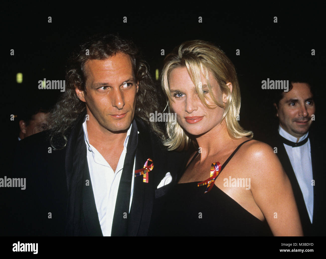 Michael Bolton and Nicollette Sheridan pictured at the Essence Magazine awards at the Paramount Theatre in New York City on May 12, 1995.  Credit: Walter McBride/MediaPunch Stock Photo