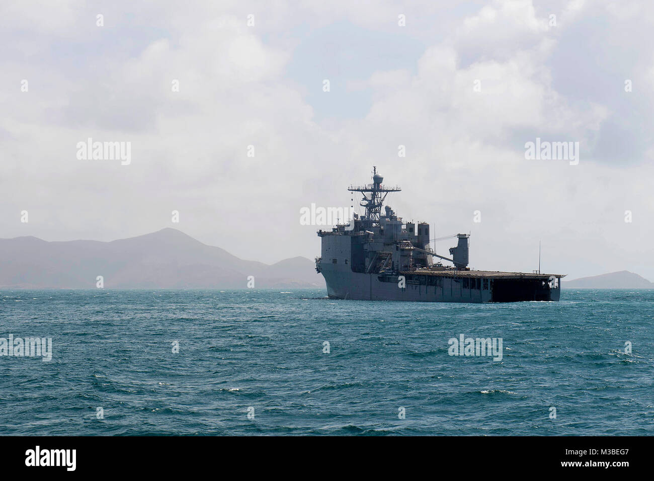 The dock landing ship USS Oak Hill anchors outside of St. John, U.S. Virgin Islands, Sept. 11. The Department of Defense is supporting Federal Emergency Management Agency, the lead federal agency, in helping those affected by Hurricane Irma to minimize suffering and is one component of the overall whole-of-government response effort. ) Stock Photo