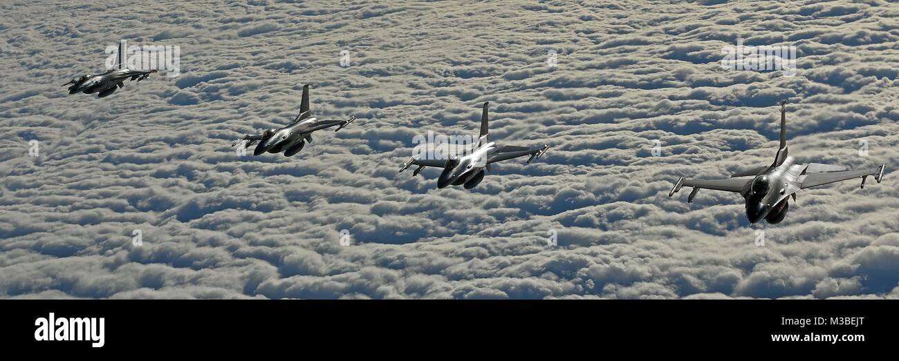 Four U S Air Force F 16c Fighting Falcons Fly In Formation During Air Refueling Training In Four U S Air Force F 16c Fighting Falcons Fly In Formation During Air Refueling Training In