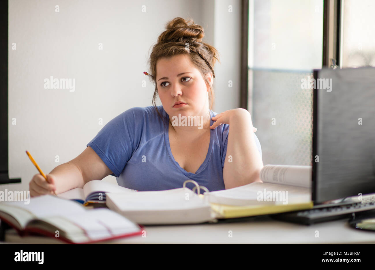 Distraught Student Thinking Stock Photo