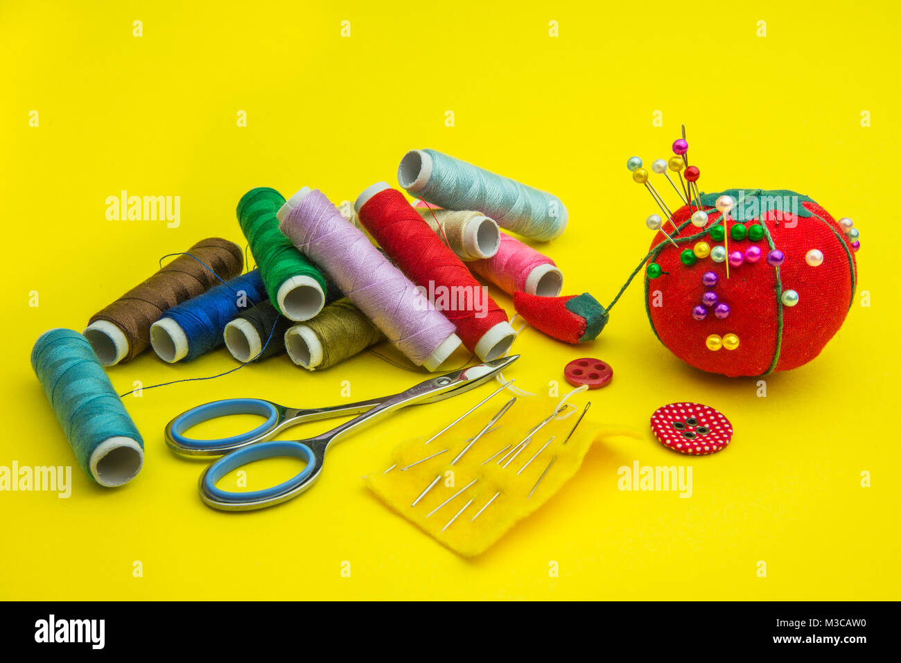 sewing tools and bobbins thread Stock Photo Alamy