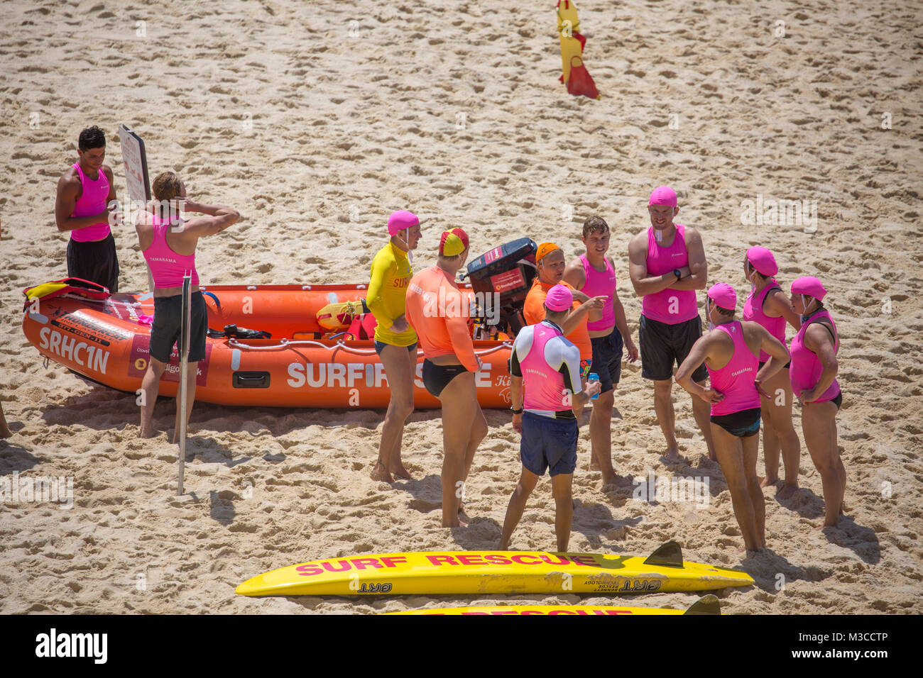 Volunteer surf rescue people on Tamarama beach in Sydney eastern suburbs, patrolling the beach and keeping people safe,NSW,Australia Stock Photo