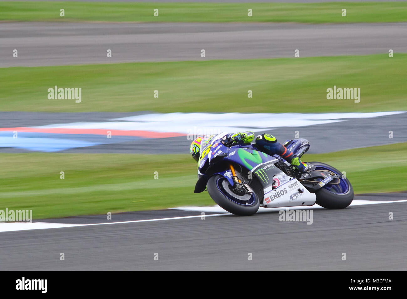 Valentino Rossi exiting Beckets corner and winding up for the Hanger straight during Friday Free Practice at the MotoGP British Grand Prix 2016 Stock Photo