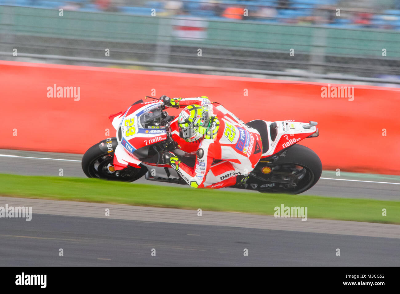 Andrea Iannone on his way to setting a quick time in the qualifying session  at the MotoGP British Grand Prix 2016 Stock Photo