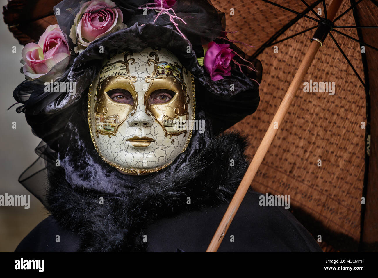 Schwäbisch Hall, Germany - February 4, 2018: Portrait of an unidentified participant dressed up in venetian style renaissance costume and mask at the  Stock Photo
