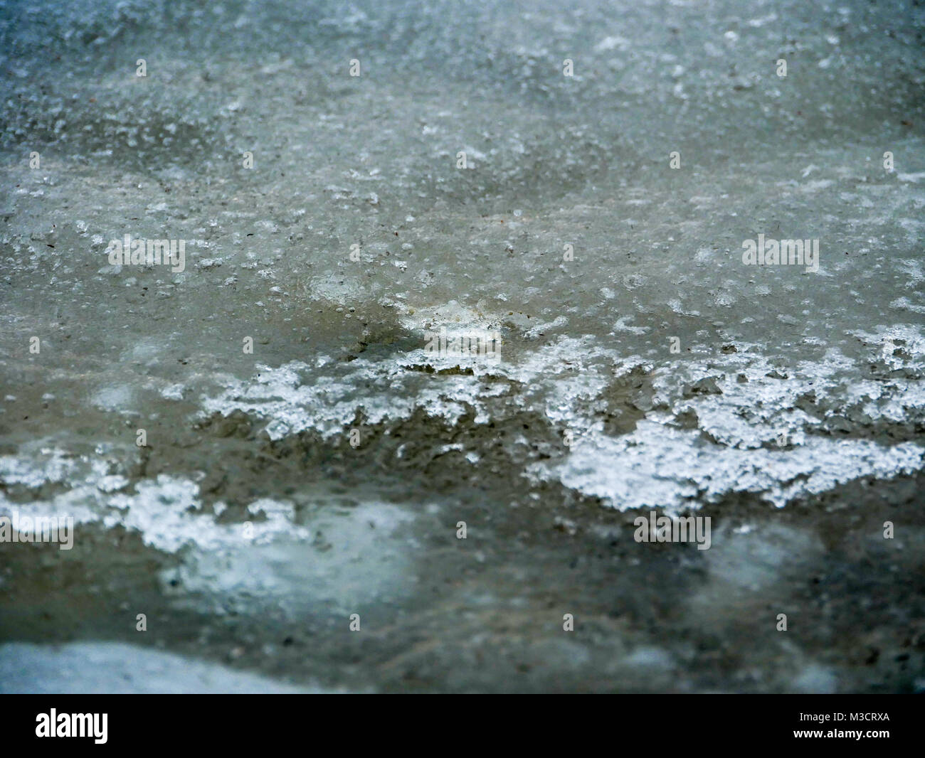 Evening on an frozen lake ice water background Stock Photo - Alamy