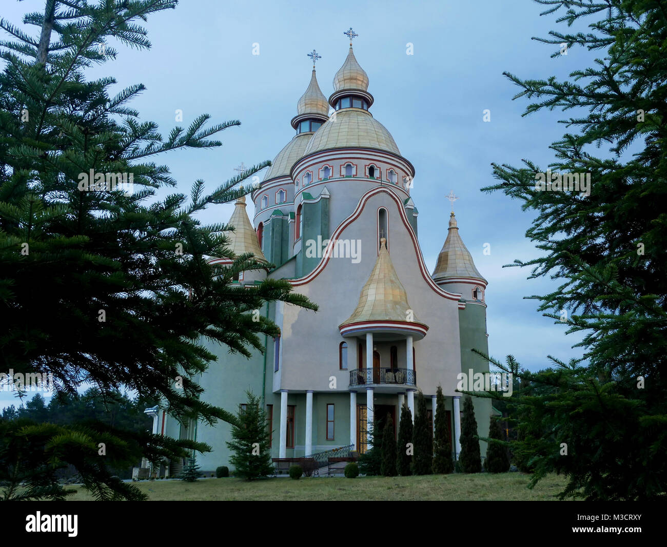 beautiful church cloudy sky background landscape forest Stock Photo - Alamy