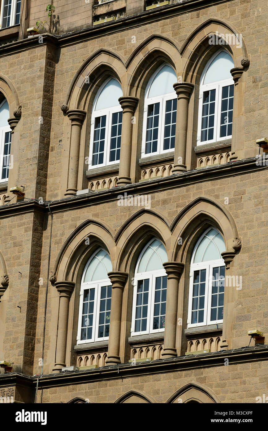 Architecture: Close up of Lancent Arched Windows with Glass Pane Stock Photo