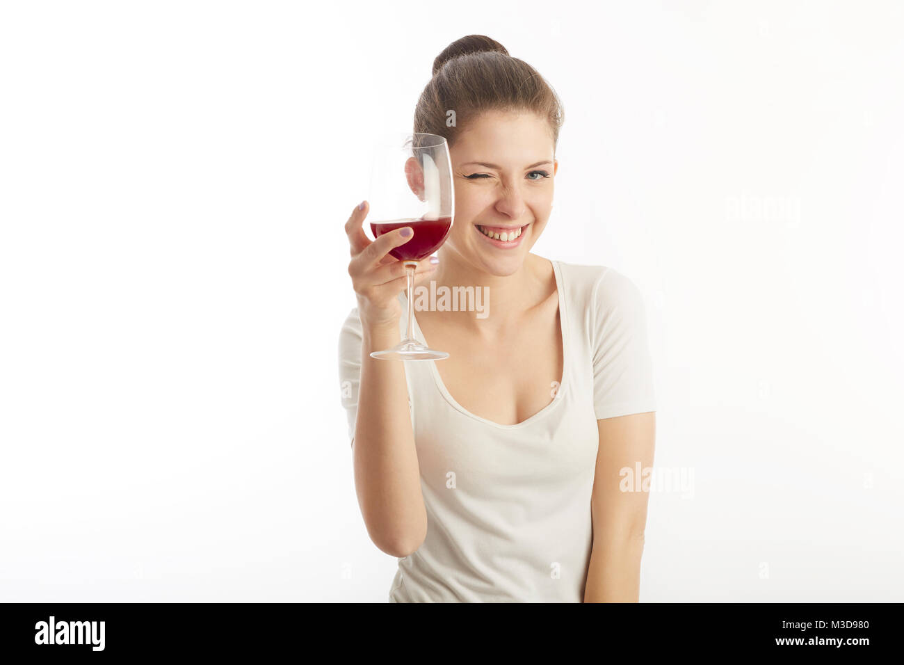 young woman drinking red wine Stock Photo