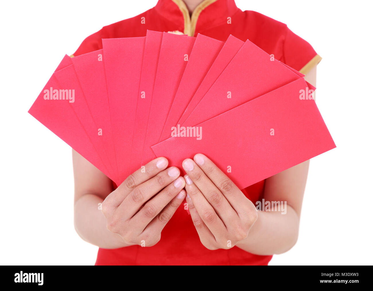 hand holding red envelope in concept of happy chinese new year isolated on a white background Stock Photo