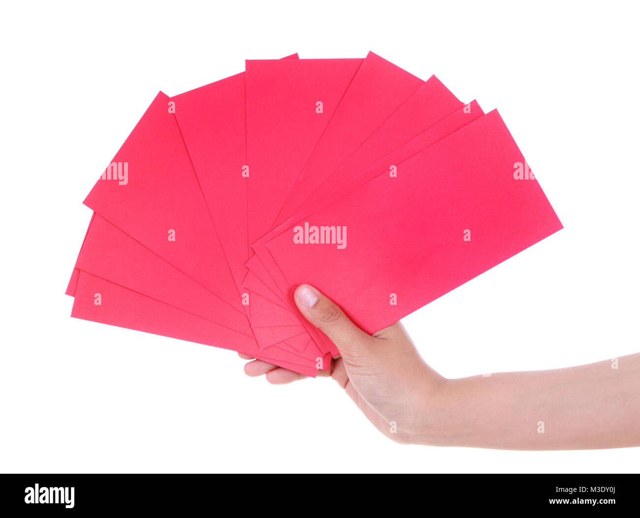 hand holding red envelope in concept of happy chinese new year isolated on a white background Stock Photo