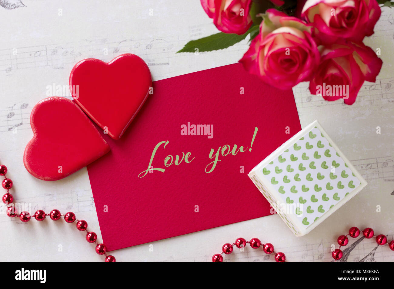 Valentines day greeting card with roses gift box hearts and lettering ...