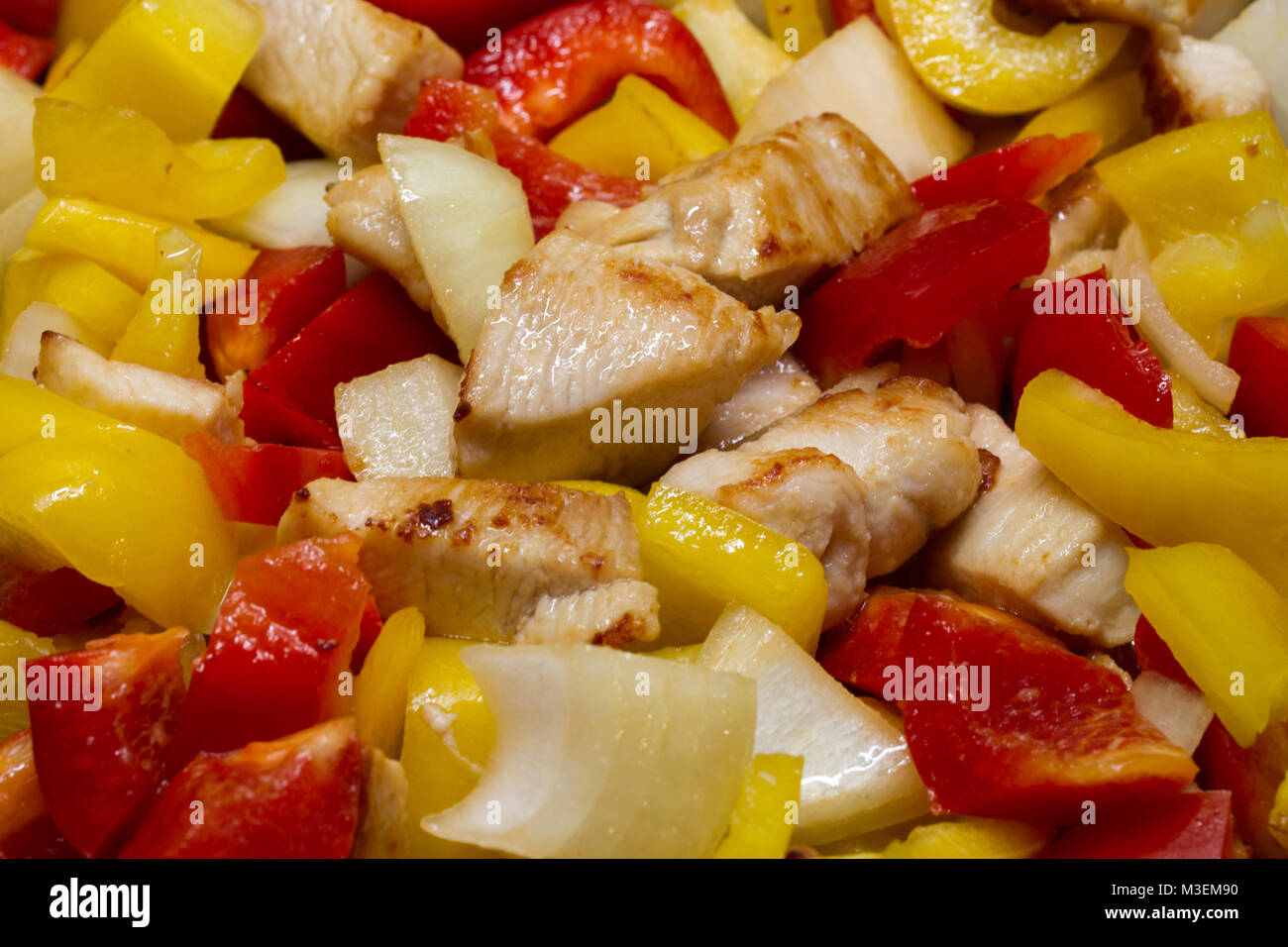 cooking peppers chicken and onion Stock Photo Alamy