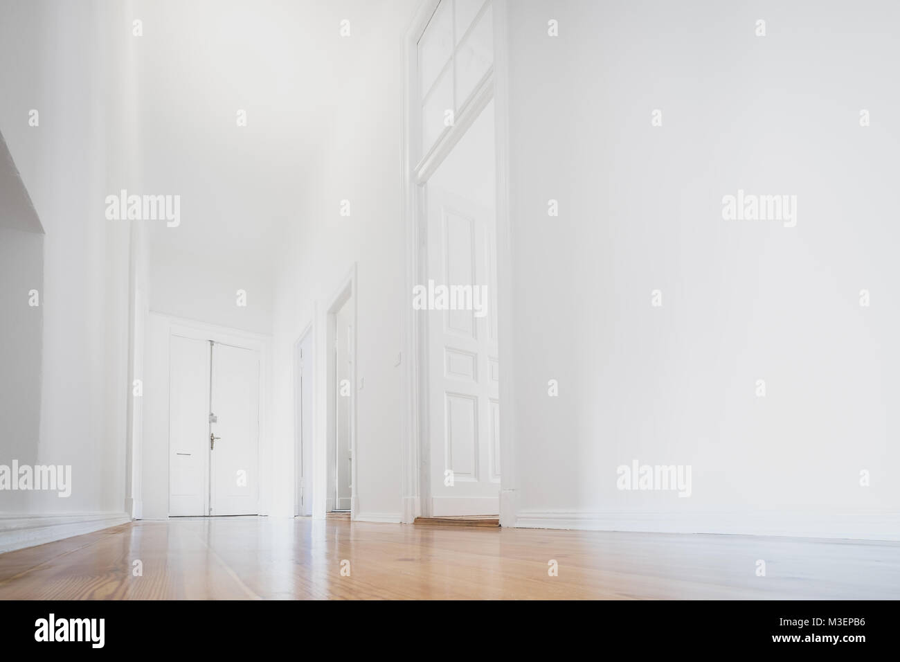white apartment , empty room newly renovated - interior - Stock Photo