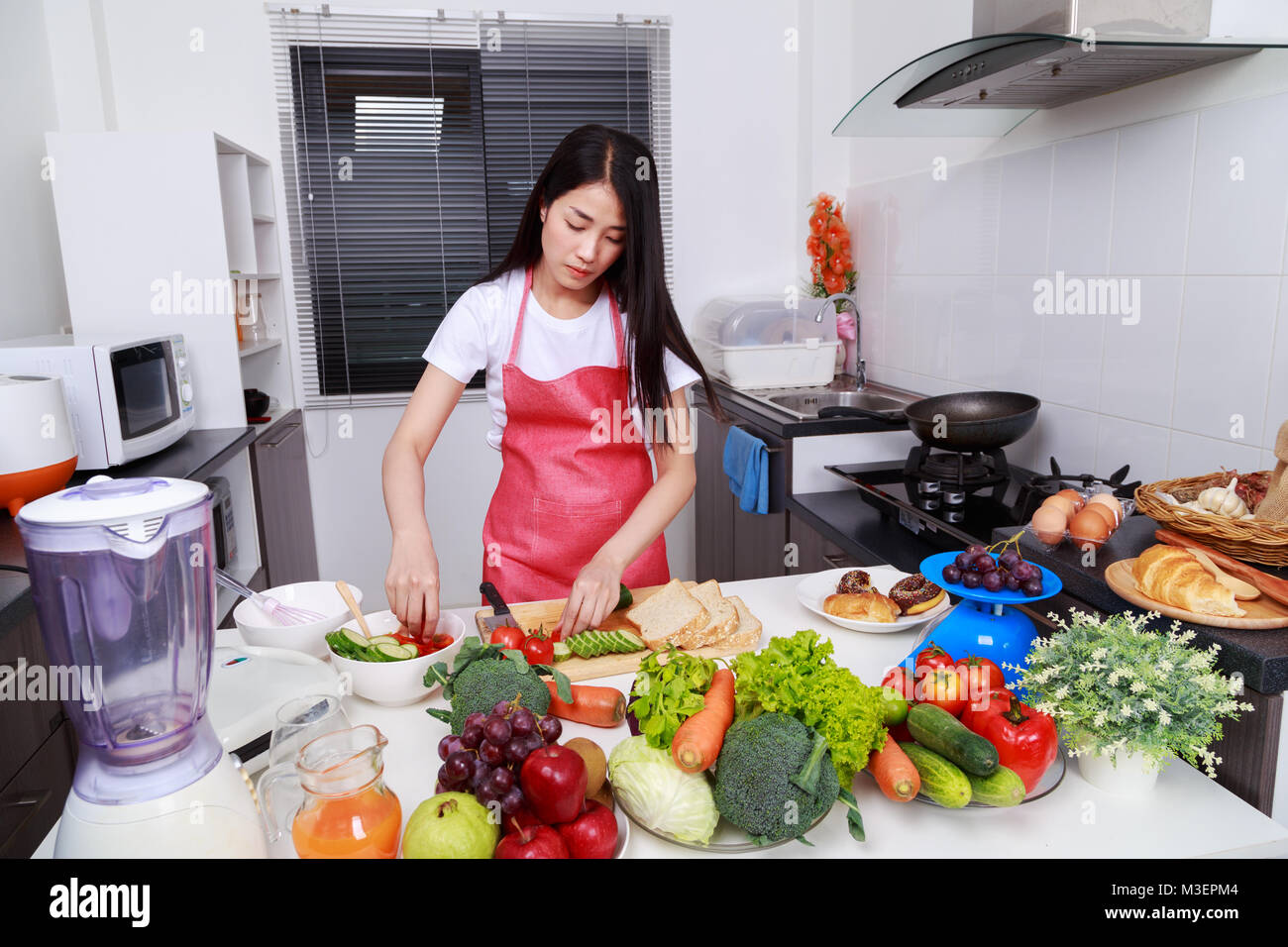 Woman Cooking In Kitchen Room At Home Stock Photo Alamy Woman Cooking In Kitchen Room At Home Stock Photo Alamy