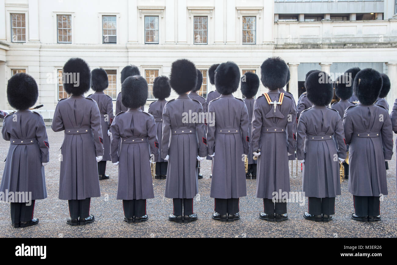 British royal guards in winter uniform ready to perform the changing of the guard in Buckingham Palace, in London, England, Great Britain Stock Photo