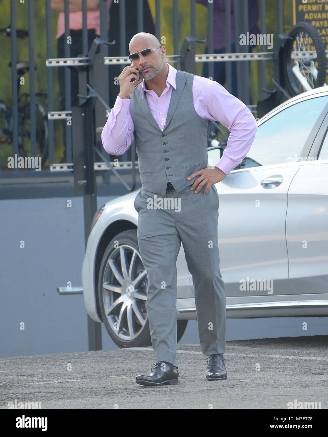 Actor Dwayne Johnson strikes a pose while filming a scene for the hit HBO  series "Ballers" filmin gin downtown Los Angeles. Featuring: Dwayne Johnson  Where: Los Angeles, California, United States When: 10