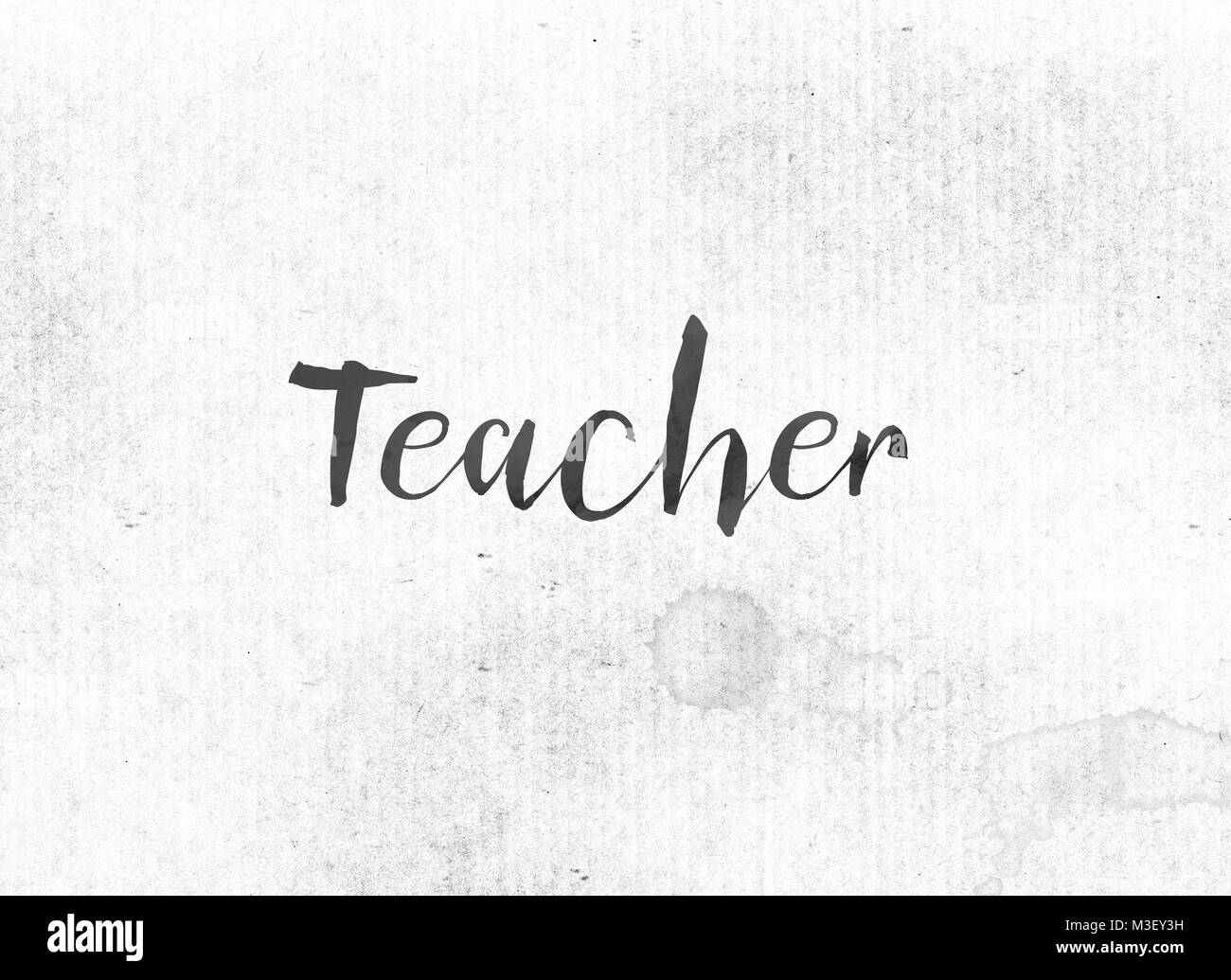 The word Teacher concept and theme painted in black ink on a watercolor