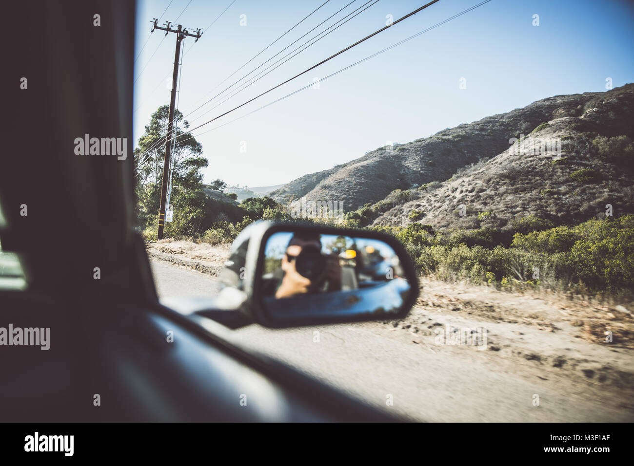 Man driving convertible car in Los angeles, santa monica Stock Photo ...