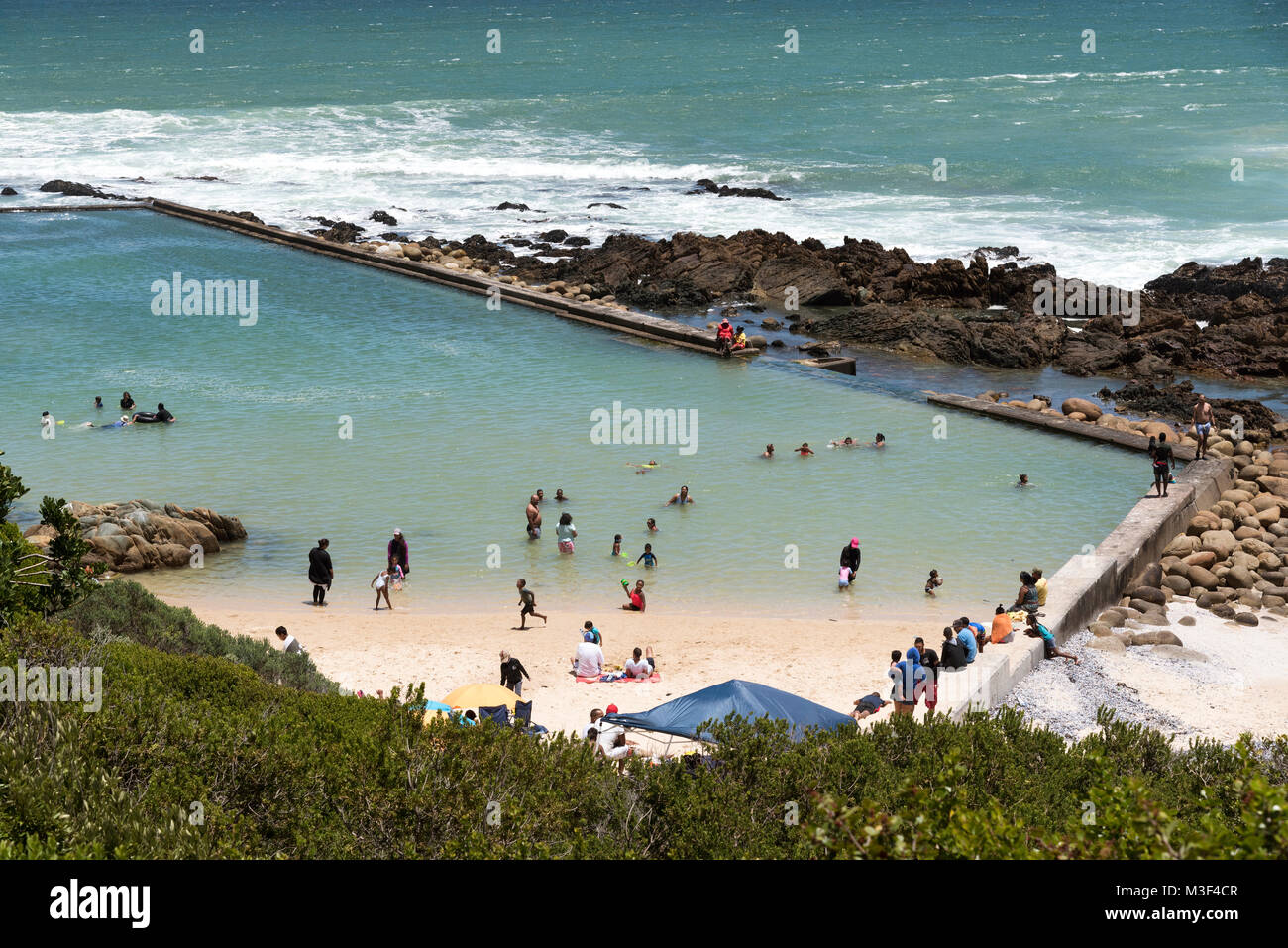 A saltwater swimming pool at Kogel Bay resort on False Bay, Western Cape, South Africa. Stock Photo