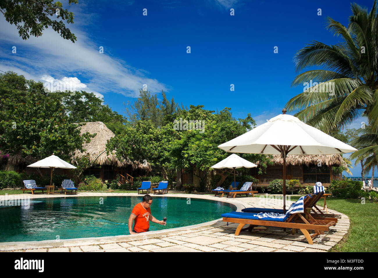 Swimming pool at The Turtle Inn Francis Ford Cappola s beach front hotel Placencia Belize Central America Stock Photo