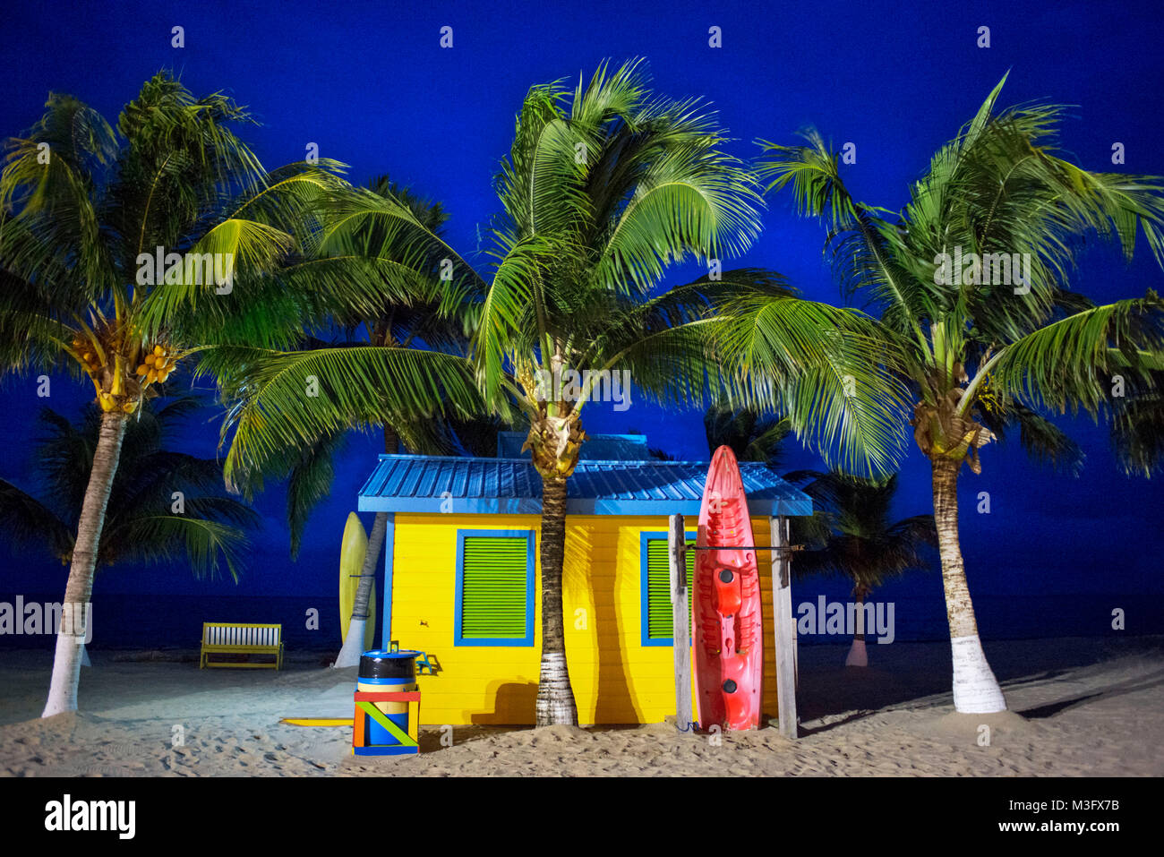 Colorful area at the beach at night in Placencia, Belize Stock Photo
