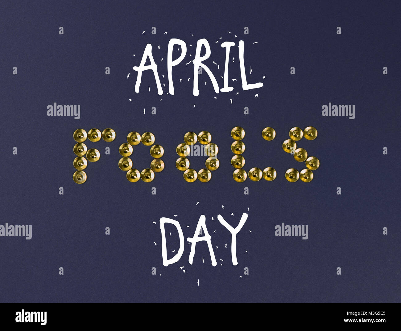 Word FOOL's is laid out of the pins tinracks on dark blue background