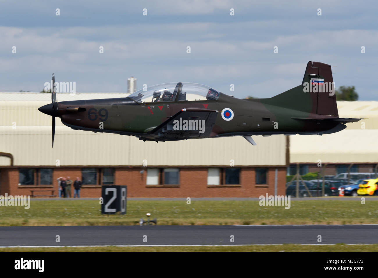 Slovenian Air Force Pilatus PC-9M ground attack aircraft taking off at the RAF Fairford Royal International Air Tattoo. Keeping low Stock Photo