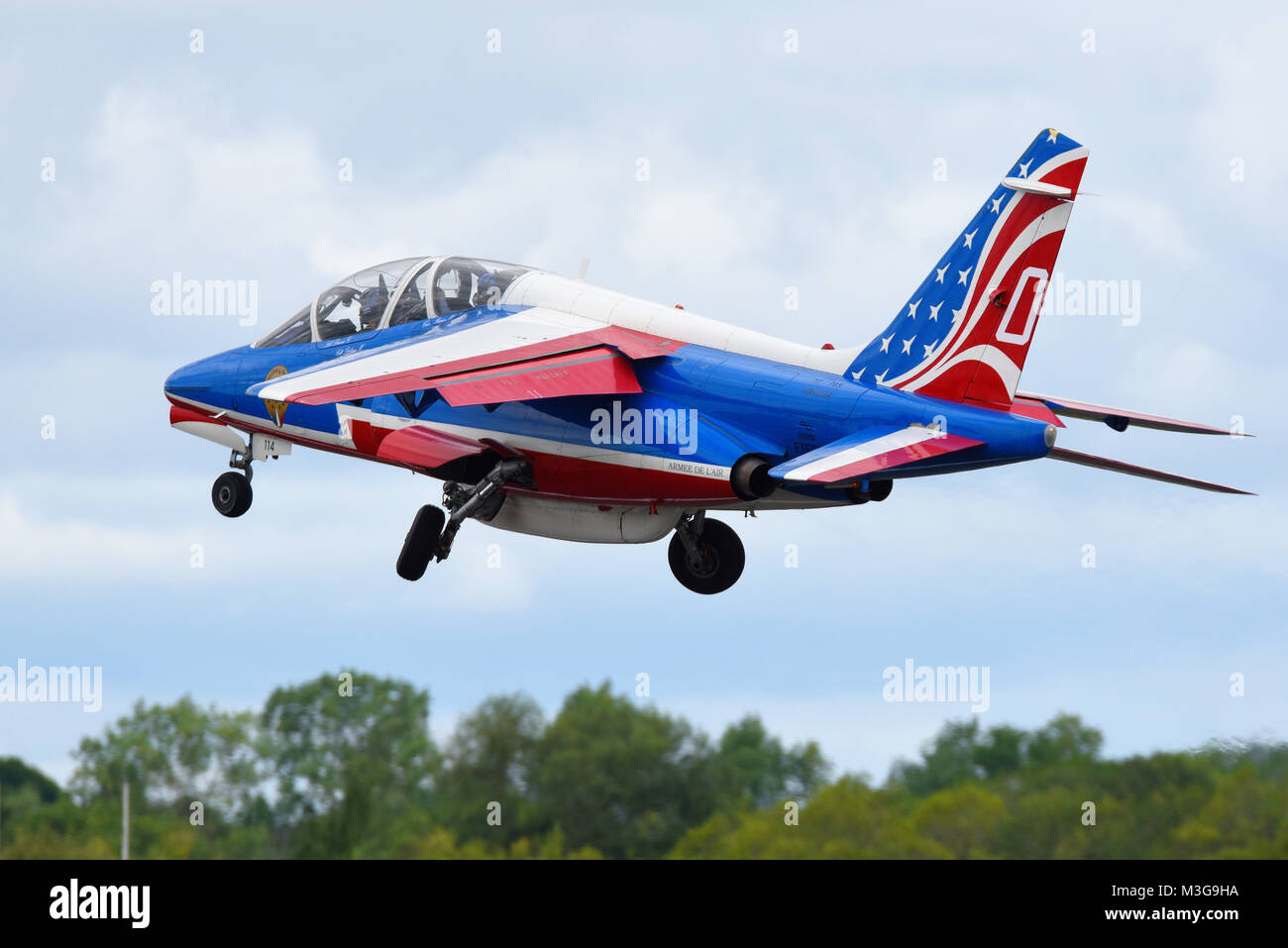 Dassault Alpha Jet of the French Air Force Patrouille de France taking off at an airshow Stock Photo