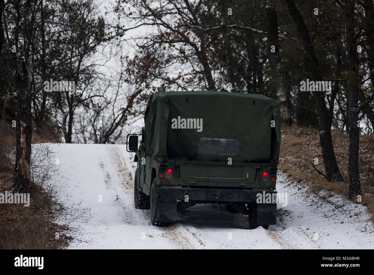 U.S. Marines with Marine Unmanned Aerial Vehicle Squadron (VMU) 2 participate in a driving course during Frozen Badger on Fort McCoy, Wis., Jan. 31, 2018. Frozen Badger is a training exercise designed to improve VMU-2's operational capabilities in extreme cold weather environments. (U.S. Marine Corps Stock Photo