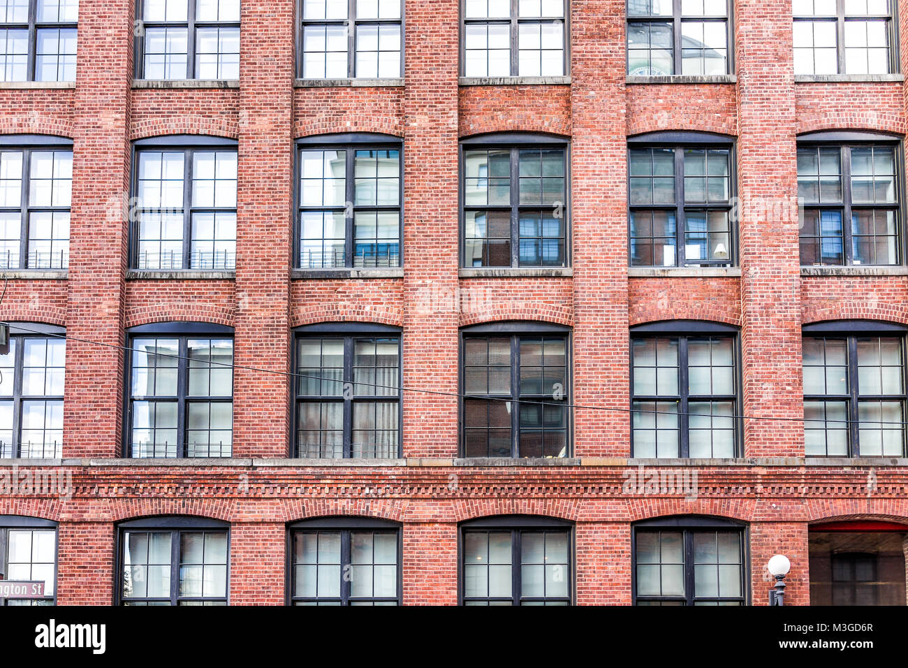 Pattern of brick glass window building in Brooklyn, NYC, New York City